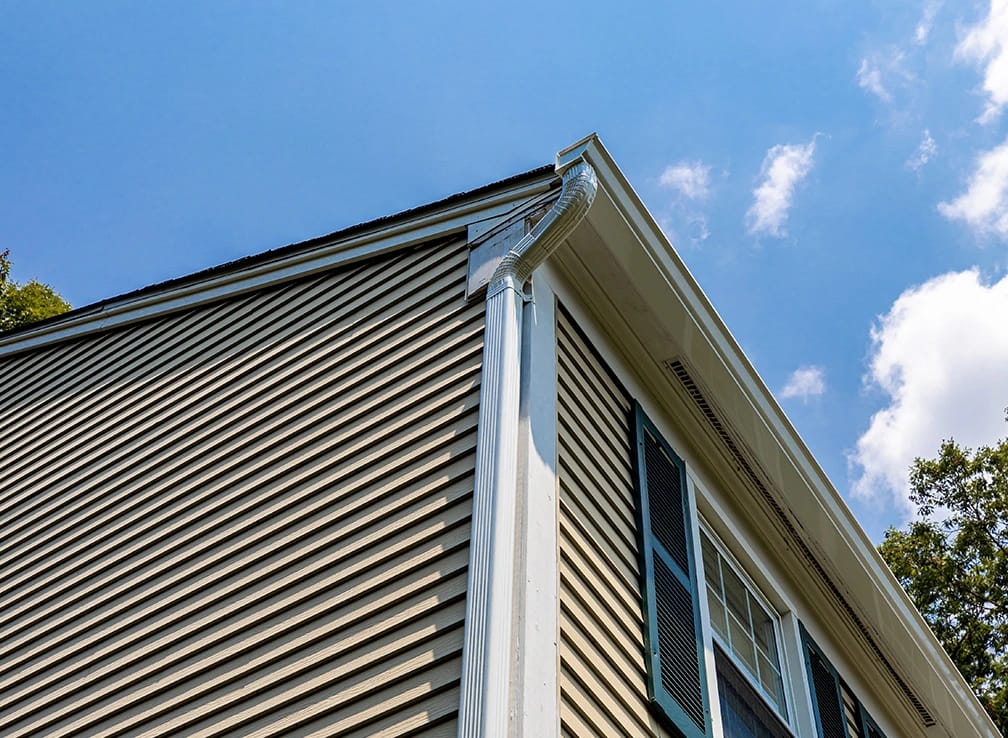 Gutters and downspouts white. 